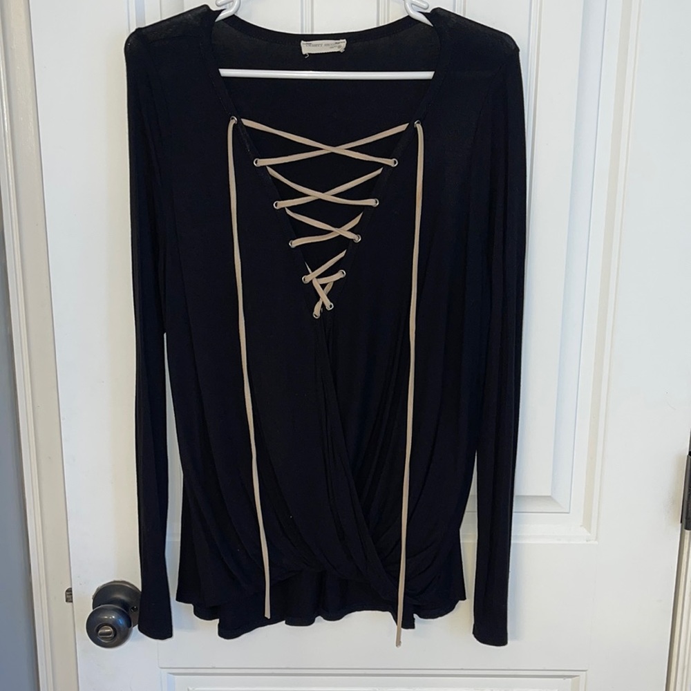 Black top with tan lace up detail
